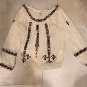 Joie blouse with appliqué and bead detail.